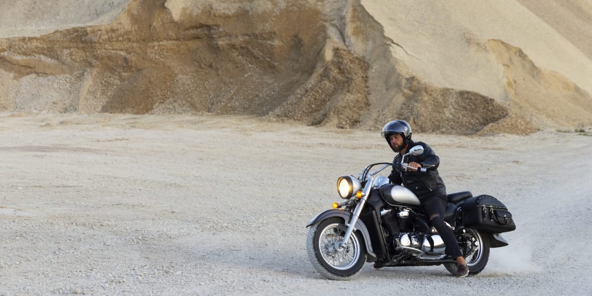 full-shot-man-riding-motorbike