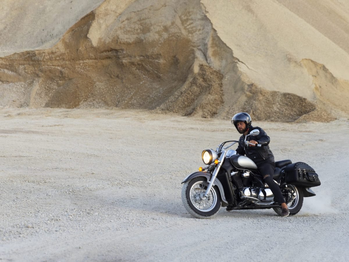 full-shot-man-riding-motorbike